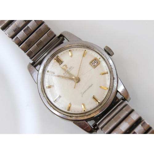 93 - A gentleman's Omega Seamaster automatic stainless steel wristwatch, cream dial with gilt baton marke... 