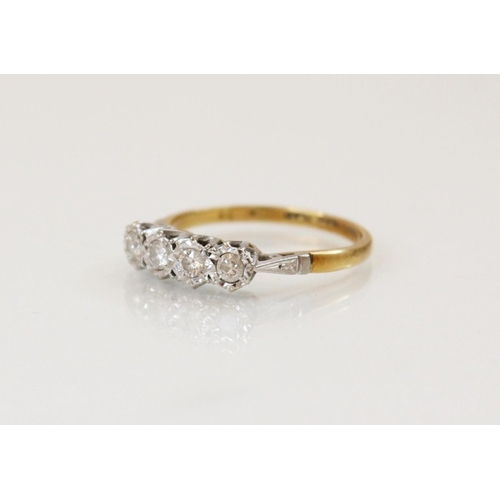 112 - A diamond four-stone ring, comprising four round brilliant cut diamonds, (weighing approximately 0.0... 