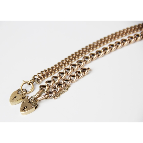 131 - A yellow metal curb link bracelet, 21.5cm long, suspending a 9ct gold heart-shaped padlock fastener,... 