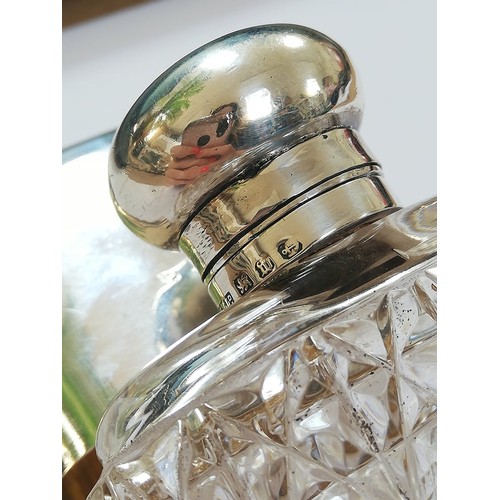 58 - A Victorian cut glass silver mounted hip flask by George Edwin Walton, Birmingham 1896, of rounded r... 
