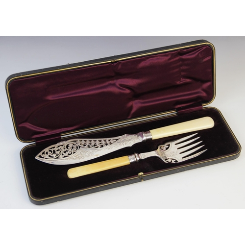 109 - An Edwardian cased fish knife and fork by R F Mosley & Co, Sheffield 1905, each with pierced scrolli... 