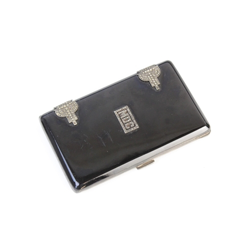 12 - An Art Deco silver cigarette case, import marks for Cohen & Charles, London 1928, of rectangular for... 