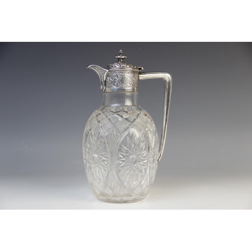 134 - A Victorian cut glass silver mounted claret jug by Atkin Brothers, Sheffield 1897, the melon form bo... 