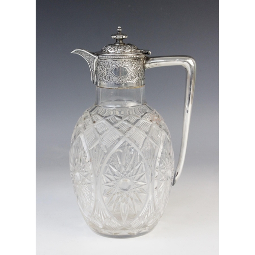 134 - A Victorian cut glass silver mounted claret jug by Atkin Brothers, Sheffield 1897, the melon form bo... 