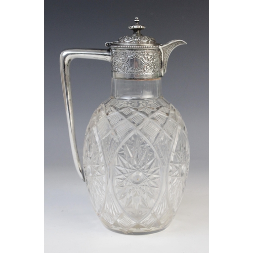 134 - A Victorian cut glass silver mounted claret jug by Atkin Brothers, Sheffield 1897, the melon form bo... 