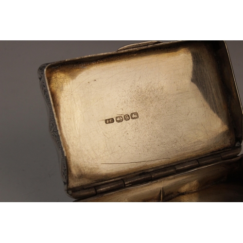 22 - A Victorian silver snuff box by Joseph Gloster, Birmingham 1892, of rectangular form with shaped bor... 