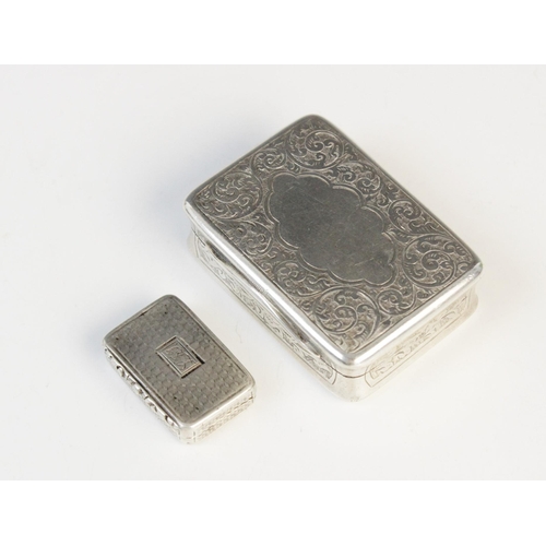 23 - A William IV silver vinaigrette by Thomas Lawrence, Birmingham 1837, 25mm x 17mm, together with a Vi... 