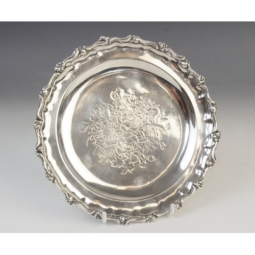 28 - A Victorian silver card tray by George John Richards, London 1848, of circular form with cast rim an... 