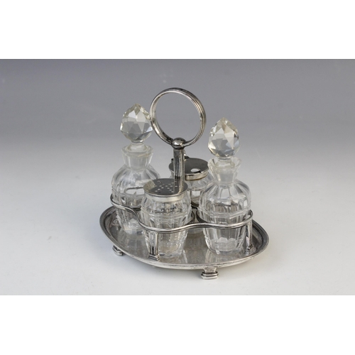 38 - A Victorian four-piece silver and cut glass cruet set and stand by John Grinsell & Sons, London 1898... 
