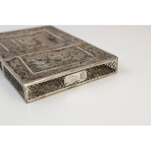 8 - An Indian silver coloured wirework card case, of rectangular form with detachable cover, the central... 