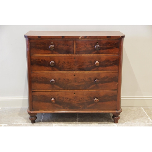 880 - A Victorian mahogany chest of drawers, the rectangular top with rounded front corners, above an arra... 