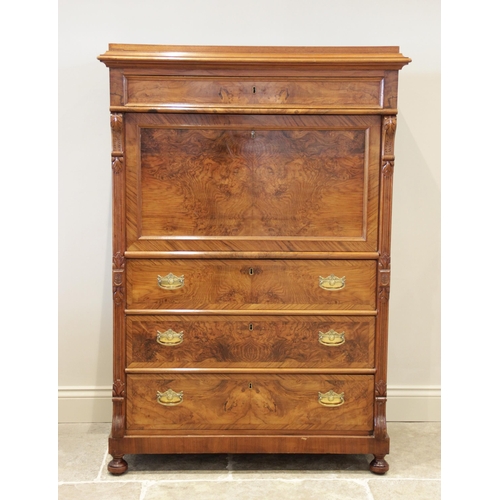 885 - A French Louis XV style figured walnut escritoire, the single frieze drawer above a fall front openi... 