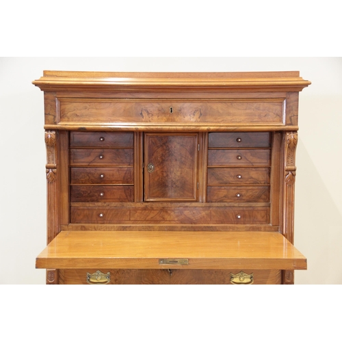 885 - A French Louis XV style figured walnut escritoire, the single frieze drawer above a fall front openi... 