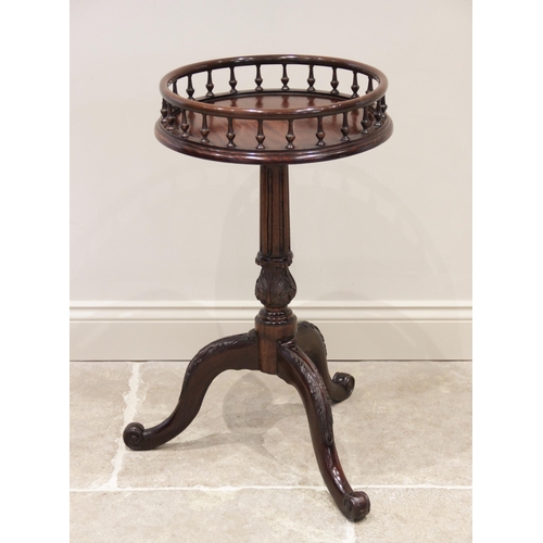 889 - A 19th century and later Chippendale style galleried mahogany wine table, the circular top with a sp... 