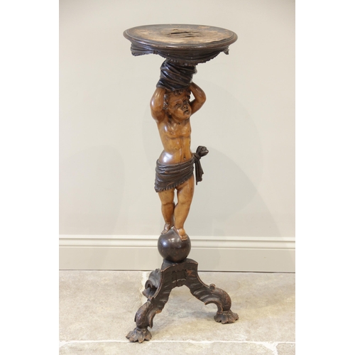 896 - An Italian stained and carved hardwood cherub figural pedestal table, late 19th/early 20th century, ... 