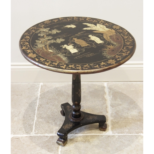 899 - A Victorian Japanned hardwood pedestal table, the circular tilt top with a gilt foliate trailing fri... 