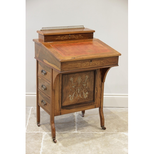 909 - A late Victorian rosewood Davenport, the rectangular hinged top with a gilt metal baluster gallery o... 