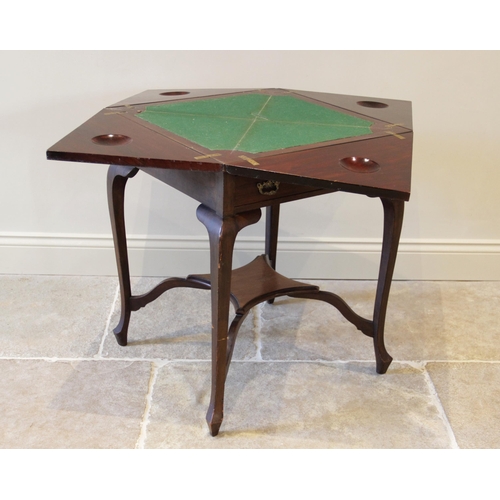 921 - An Edwardian mahogany envelope bridge table, the square quarter folding top above a single frieze dr... 