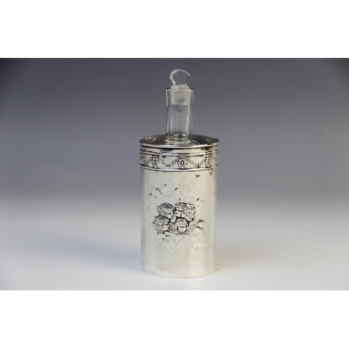 93 - An Edwardian silver mounted glass scent bottle by Henry Matthews, Birmingham 1905, the colourless gl... 