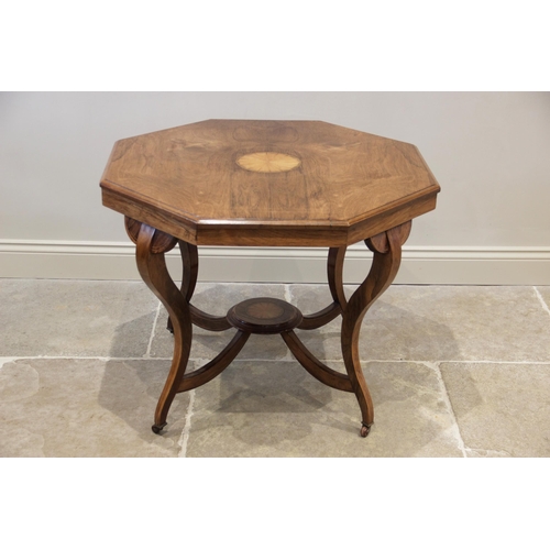 937 - An Edwardian octagonal rosewood occasional table, centrally inlaid with a scalloped fan roundel, rai... 