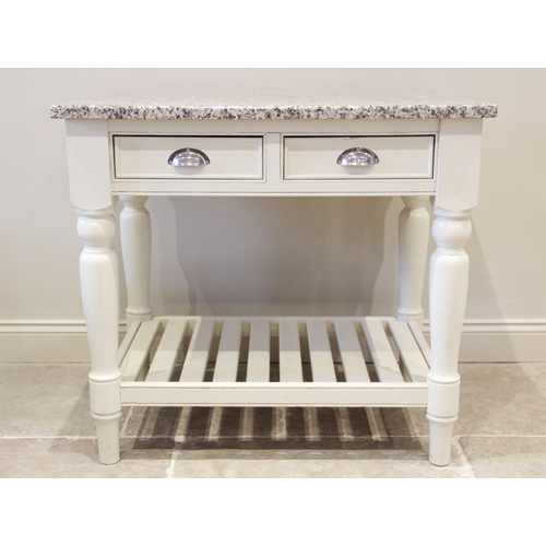 939 - A Laura Ashley type marble top painted kitchen island, the rectangular slab marble top above a pair ... 