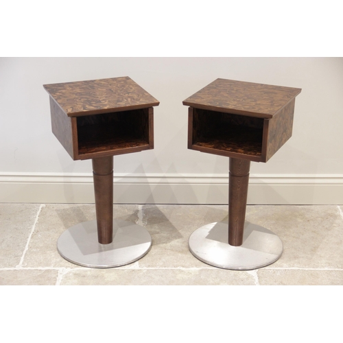 940 - A pair of 1970's retro bedside/lamp tables, the square burr veneered tops above a rectangular vacant... 