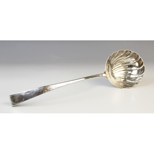 99 - A George III Irish silver ‘hook-end’ soup ladle, marks for ‘W.F’, Dublin 1771, scalloped bowl with s... 