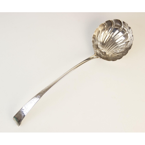 99 - A George III Irish silver ‘hook-end’ soup ladle, marks for ‘W.F’, Dublin 1771, scalloped bowl with s... 