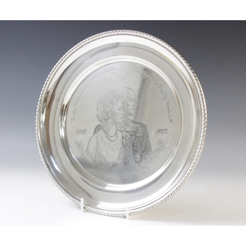 114 - A silver commemorative salver for the Silver Wedding Anniversary of Her Majesty Queen Elizabeth II a... 