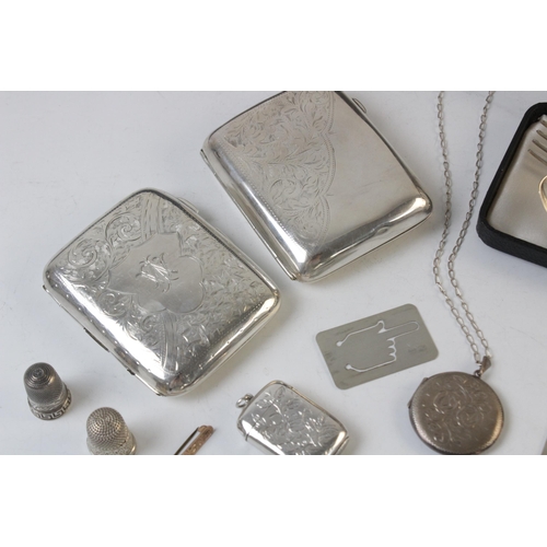 128 - A selection of gold and silver accessories and tableware, to include; a silver cigarette case by Rol... 