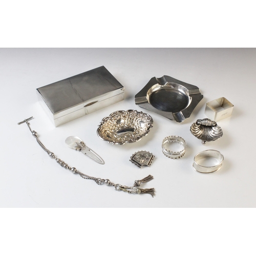 129 - A selection of silver and silver coloured tableware and accessories, to include; a silver mounted ci... 