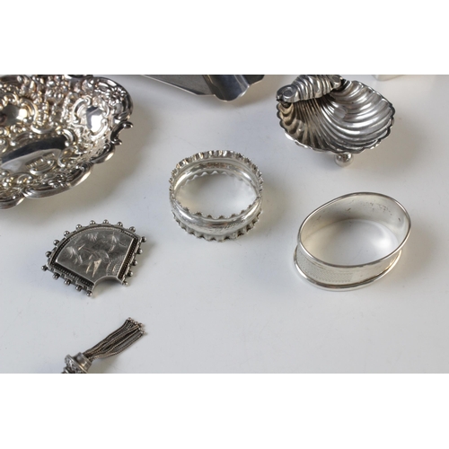 129 - A selection of silver and silver coloured tableware and accessories, to include; a silver mounted ci... 