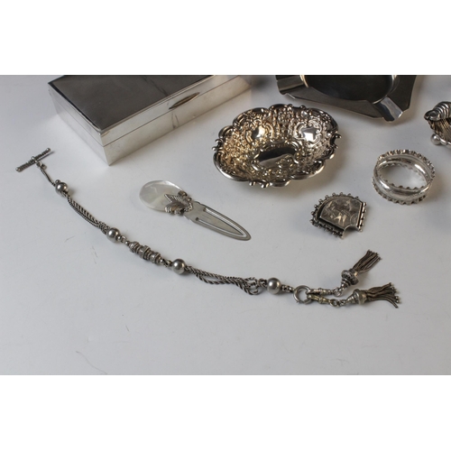 129 - A selection of silver and silver coloured tableware and accessories, to include; a silver mounted ci... 