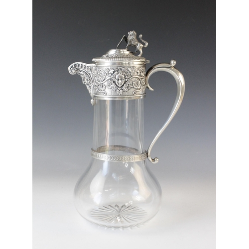 77 - An Edwardian cut glass silver mounted claret jug by Goldsmiths & Silversmiths Co Ltd, London 1901, o... 