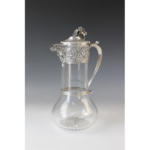 77 - An Edwardian cut glass silver mounted claret jug by Goldsmiths & Silversmiths Co Ltd, London 1901, o... 