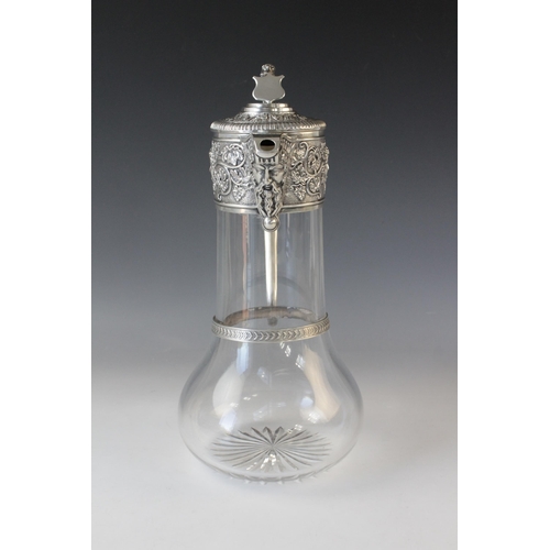 77 - An Edwardian cut glass silver mounted claret jug by Goldsmiths & Silversmiths Co Ltd, London 1901, o... 