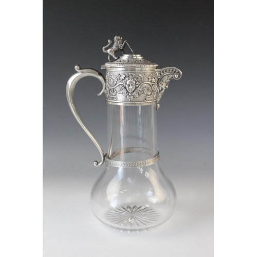 77 - An Edwardian cut glass silver mounted claret jug by Goldsmiths & Silversmiths Co Ltd, London 1901, o... 