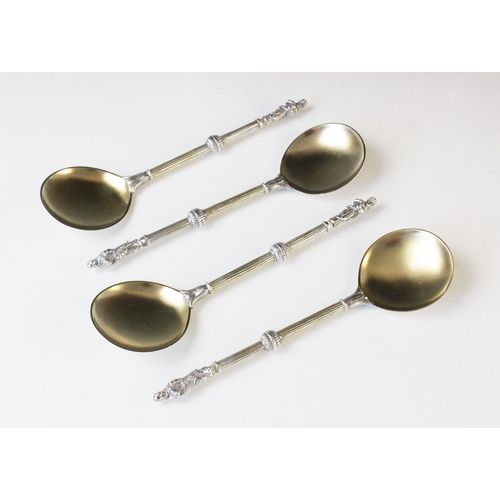 79 - A Victorian cased set of four silver and silver gilt apostle spoons by Army & Navy Co-operative Soci... 