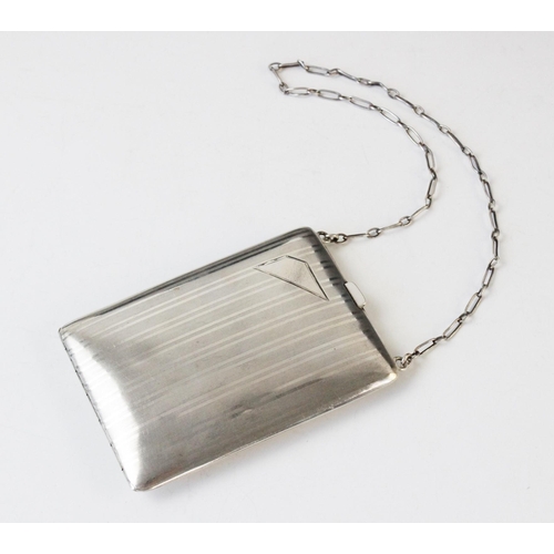 83 - A sterling silver minaudiere by Webster Company, of rectangular form with engine turned decoration t... 