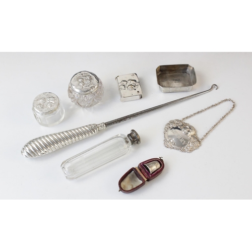 89 - A selection of silver and silver plated dressing tableware, including; an Edwardian silver topped dr... 