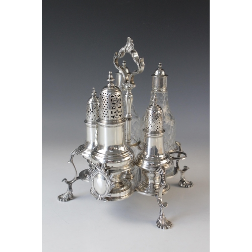 94 - A George III silver cruet stand by Thomas & Jabez Daniell, London 1772, cinquefoil form with central... 