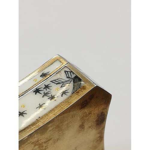 69 - An early 20th century Austrian silver gilt and enamel box, of shaped rectangular form with canted co... 