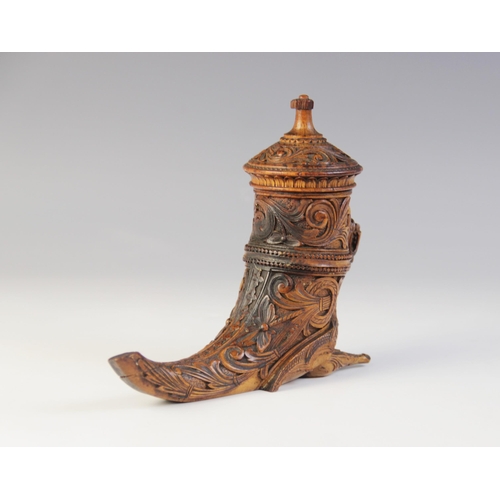 107 - A Scandinavian treen Cornucopia/horn vessel and cover, 20th century, extensively carved with scrolls... 