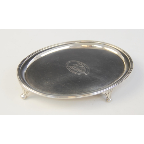 26 - A George III silver teapot stand, marked ‘IT’ (possibly John Tatum I), London 1790, of oval form wit... 