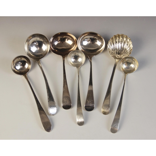 34 - A selection of George III and later silver sauce ladles, to include; pair of George III Old English ... 