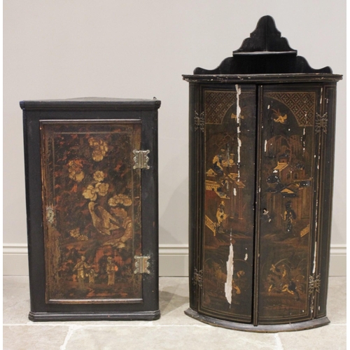 581 - A 19th century Japanned bowfront hanging corner cupboard, the twin doors applied with painted detail... 