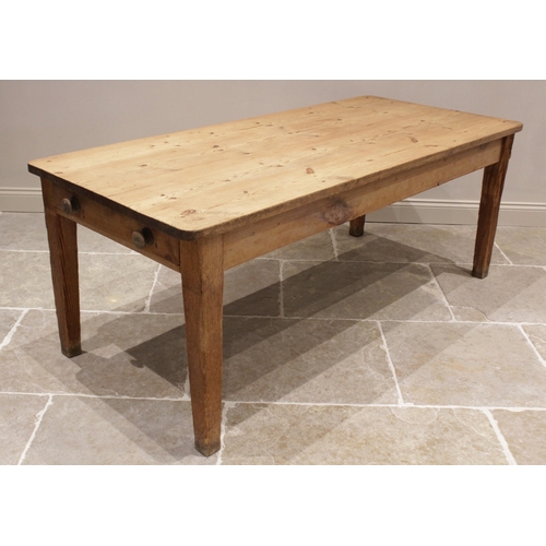 589 - A Victorian and later pine scrub top kitchen table, the rectangular table top with rounded corners o... 