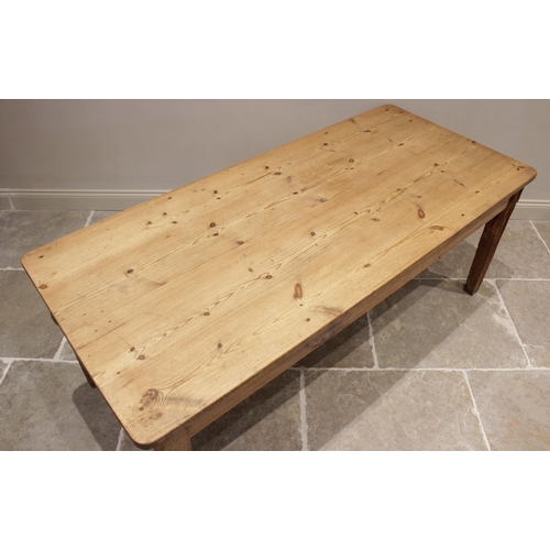 589 - A Victorian and later pine scrub top kitchen table, the rectangular table top with rounded corners o... 