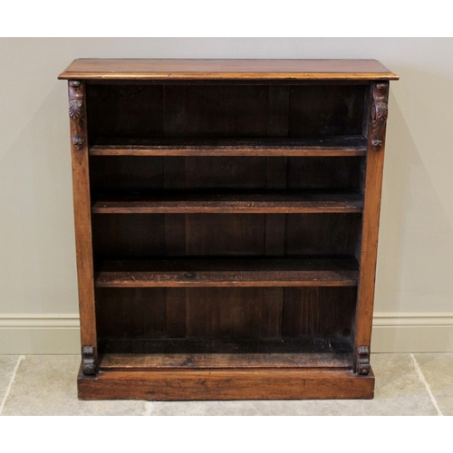 595 - A Victorian rosewood open bookcase, the rectangular moulded top above three adjustable shelves, flan... 