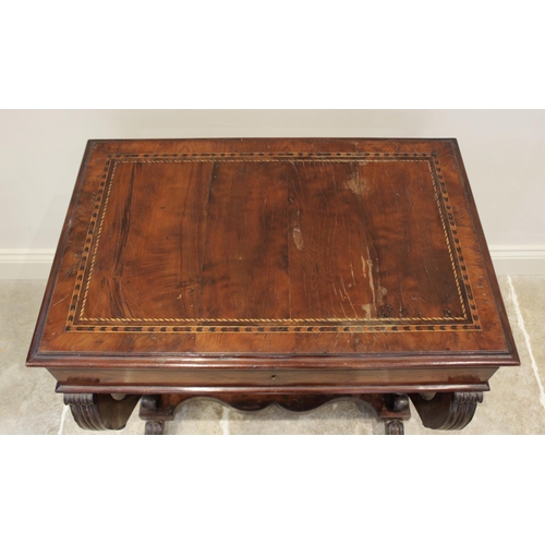 604 - A mid 19th century yew wood work or stationery table, the rectangular moulded and hinged top inlaid ... 